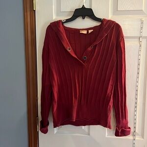 Northcrest-size medium-red longsleeve, hooded sweater. Two snap buttons in front